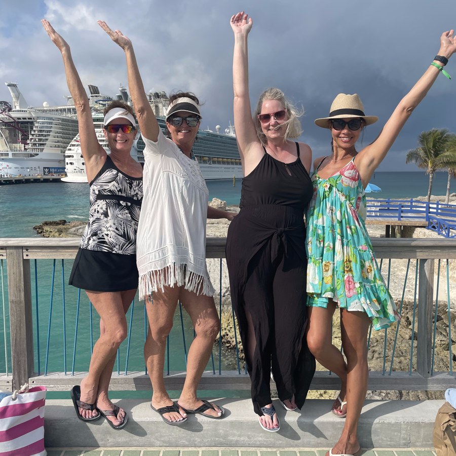 A group of friends celebrating on a Caribbean beach